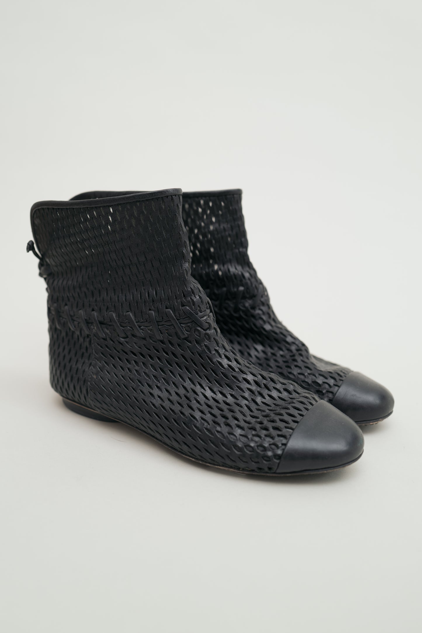CHANEL PERFORATED LEATHER BOOTS