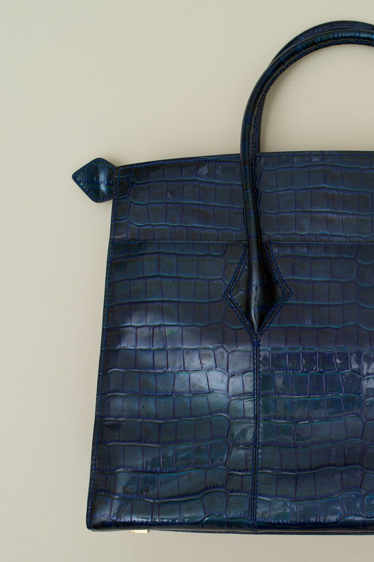 ST JOHN EMBOSSED LEATHER BAG