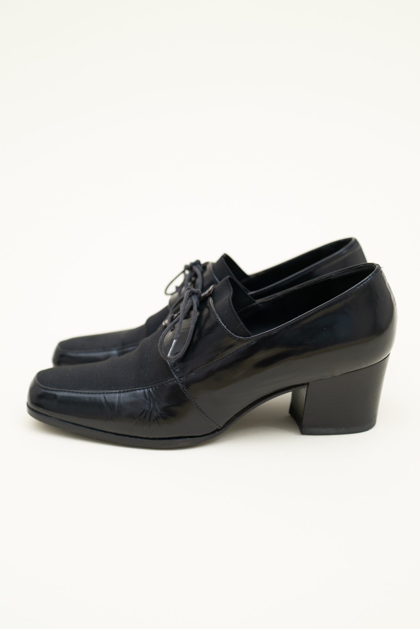 PRADA HEELED LOAFERS