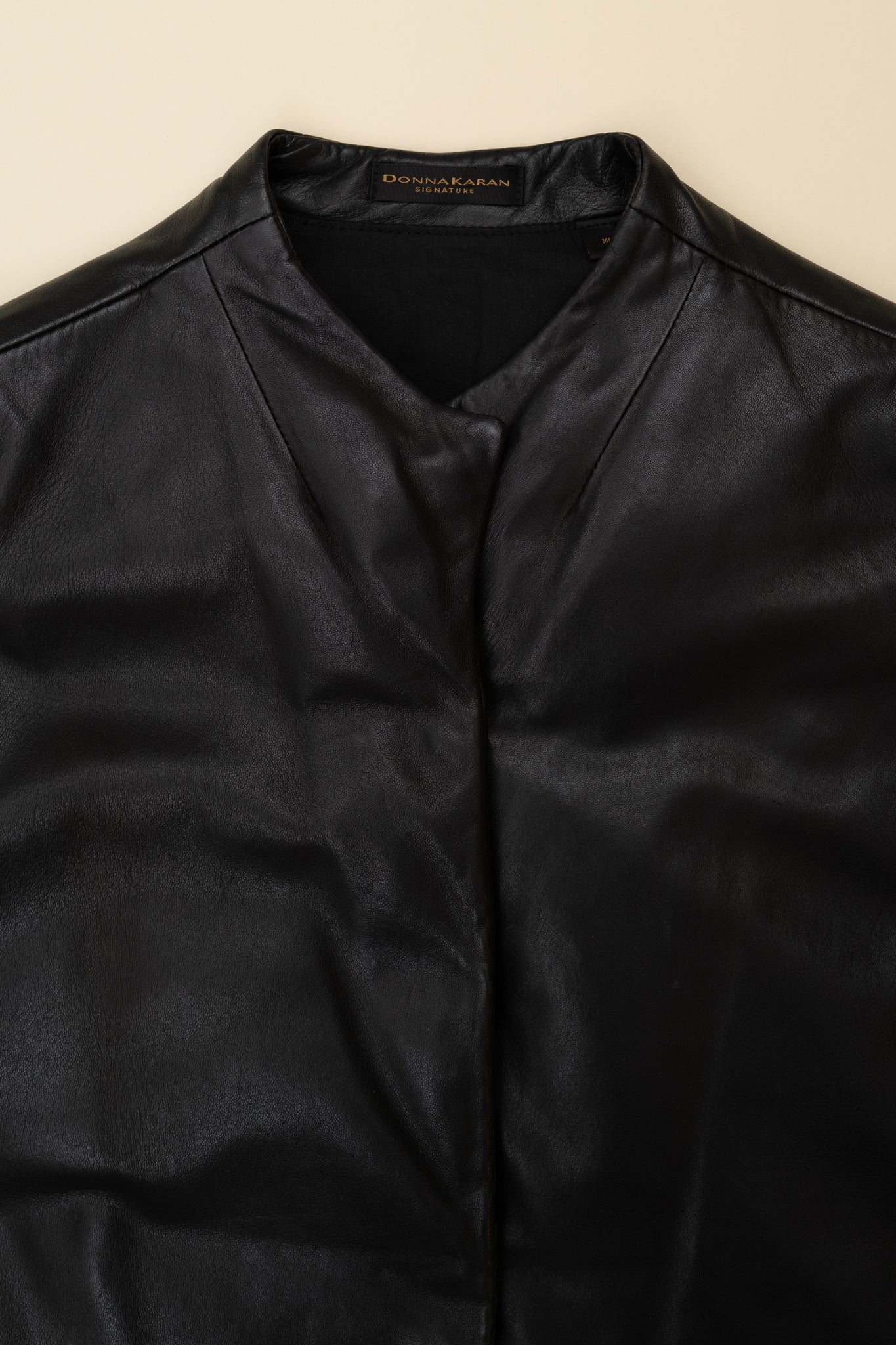 DONNA KARAN LEATHER PUFFER VEST