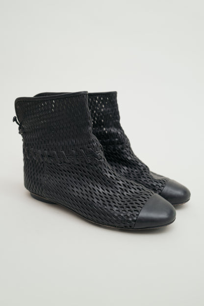 CHANEL PERFORATED LEATHER BOOTS