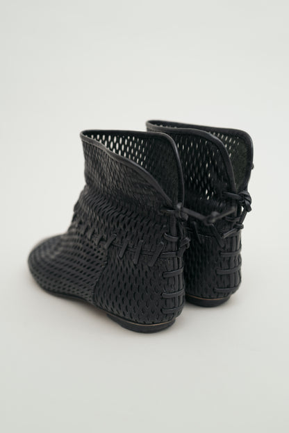 CHANEL PERFORATED LEATHER BOOTS