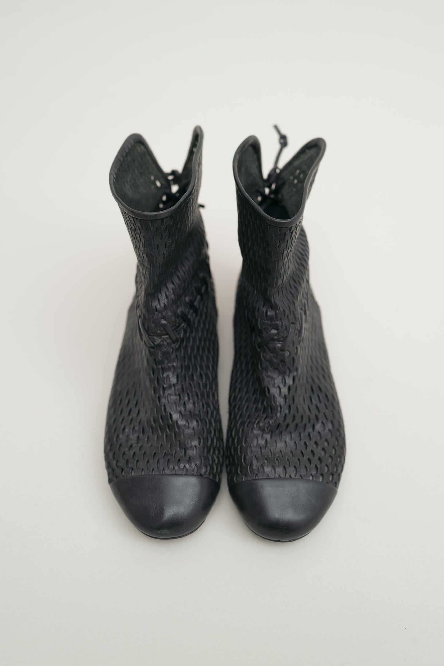 CHANEL PERFORATED LEATHER BOOTS