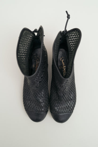 CHANEL PERFORATED LEATHER BOOTS