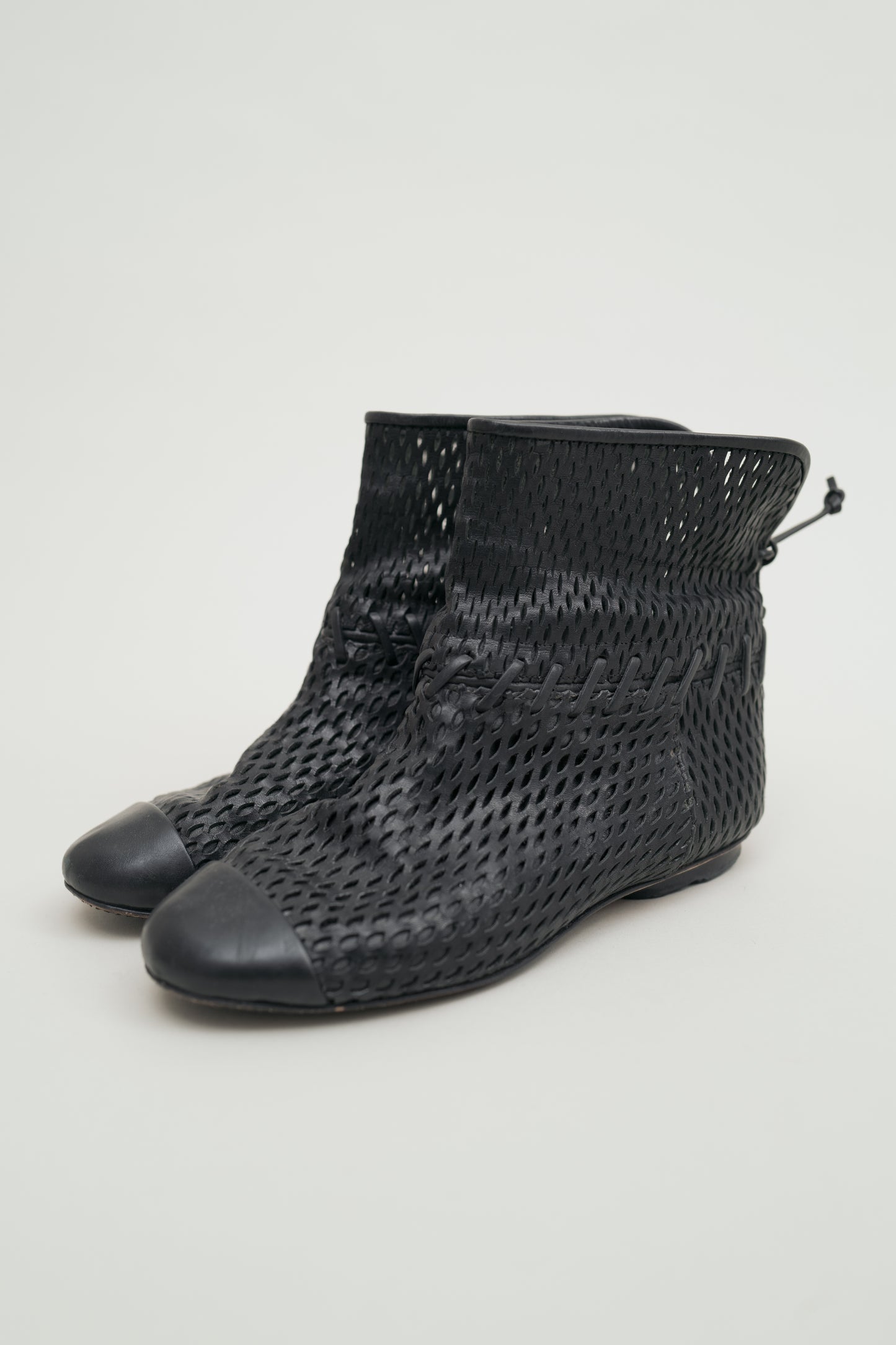 CHANEL PERFORATED LEATHER BOOTS