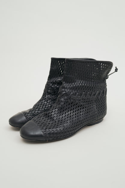 CHANEL PERFORATED LEATHER BOOTS