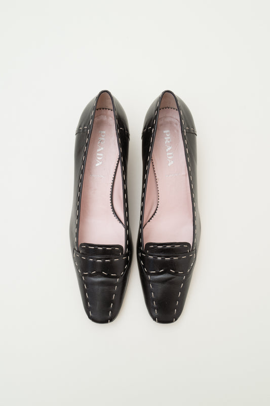 PRADA HEELED LOAFERS